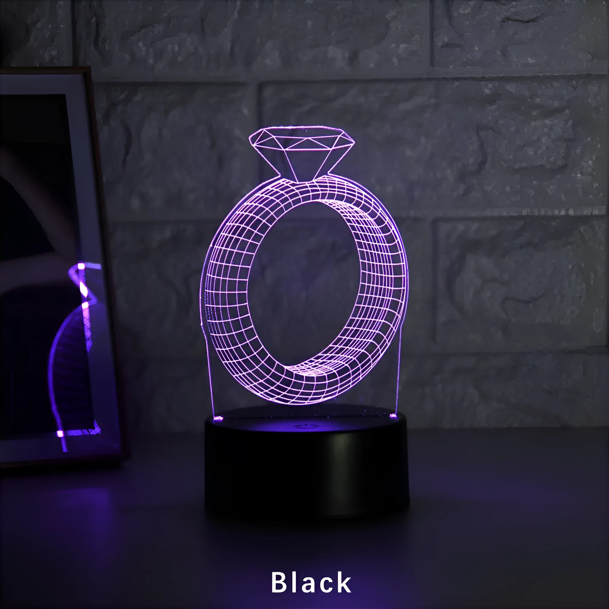 3D stereoscopic LED night light showing an illuminated diamond ring design on a black, white, or cracked white background.