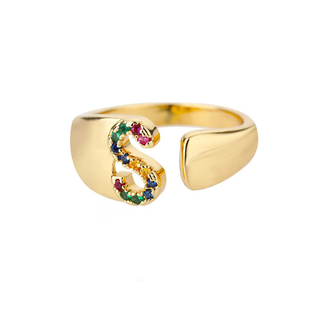 Fashion micro-set colored zirconium adjustable open ring showing letter A on a copper electroplated base
