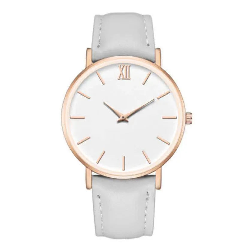 Ladies fashion quartz watch with frosted imitation leather strap, round alloy case, 38mm dial, white dial, pin buckle clasp, onion crown