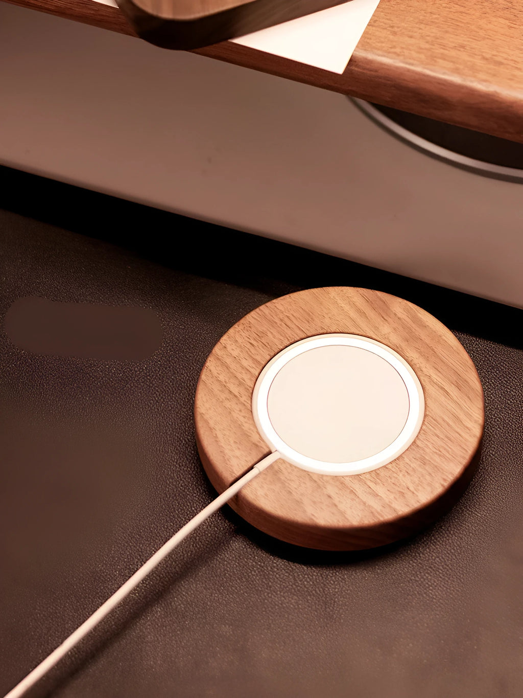Walnut wood magnetic wireless charging base with protective cover on desktop