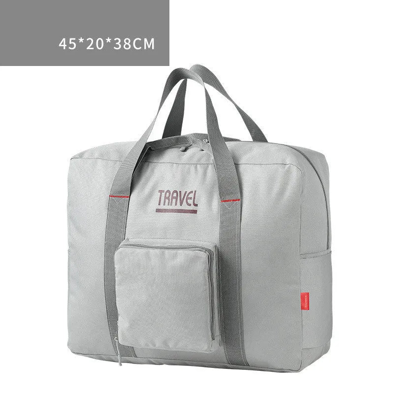 Foldable large capacity canvas travel bag in grey with soft handle and zipper pocket