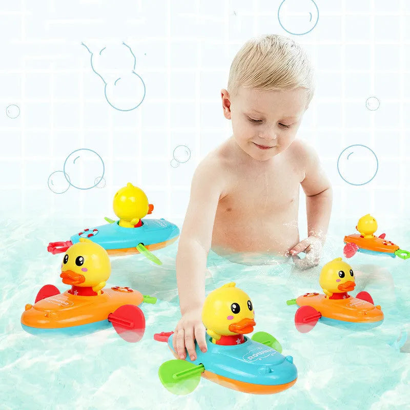 Yellow plastic wind-up swimming bath toy for interactive water play