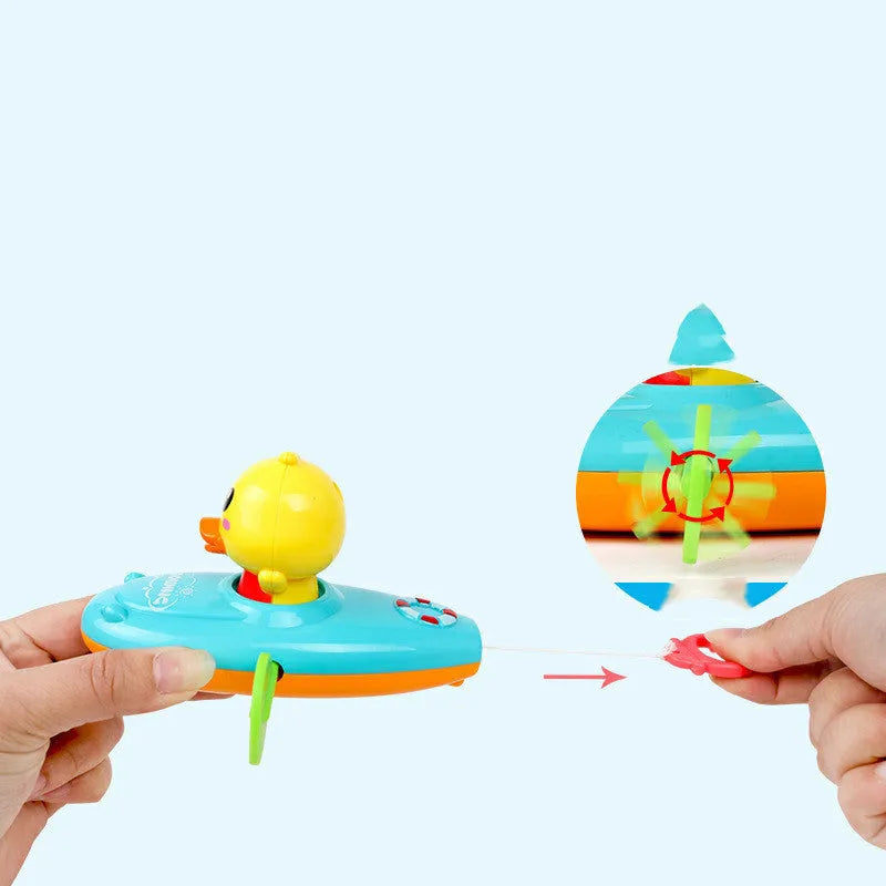 Yellow plastic wind-up swimming bath toy for interactive water play