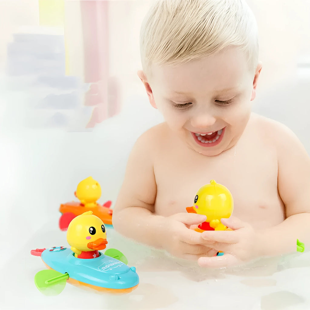 Yellow plastic wind-up swimming bath toy for interactive water play