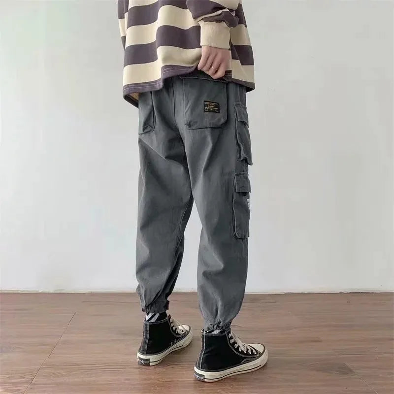Men's multi-pocket casual loose fit nine-tenths length overalls in khaki colour