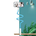 Adjustable mobile phone holder with memory alloy hose in bedside setting