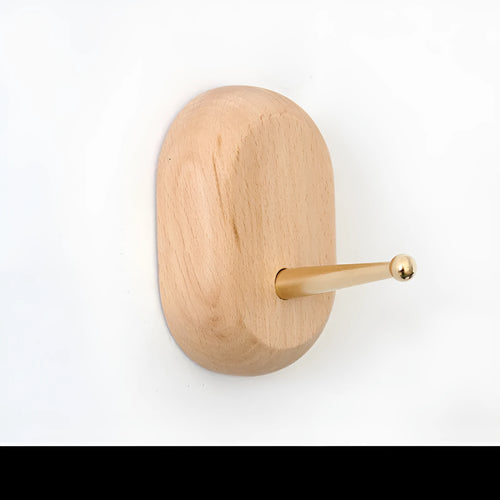 Solid beech wood and brass adhesive wall hook showing five shape options: round, capsule, oval, diamond, and square.