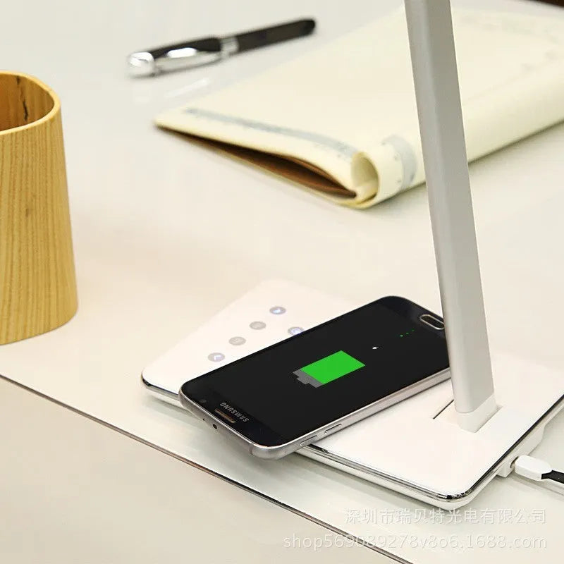 Black wireless charging desk lamp with touch controls and USB power connectivity