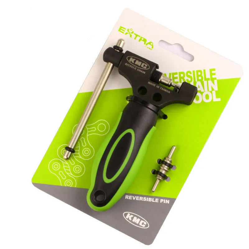 Green steel bicycle chain repair tool with double shaft chaining mechanism on a white background.