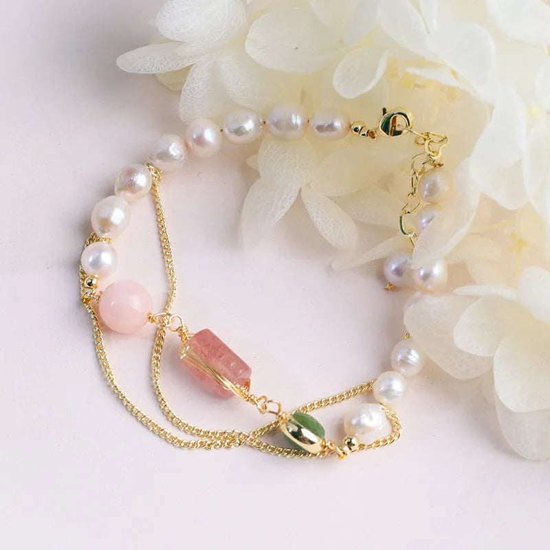 Women's pink freshwater pearl bracelet with geometric strawberry crystal charms