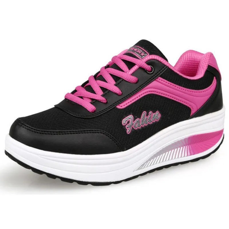 Women's grey powder mid-heel heelless travel and sports shoes on a white background.