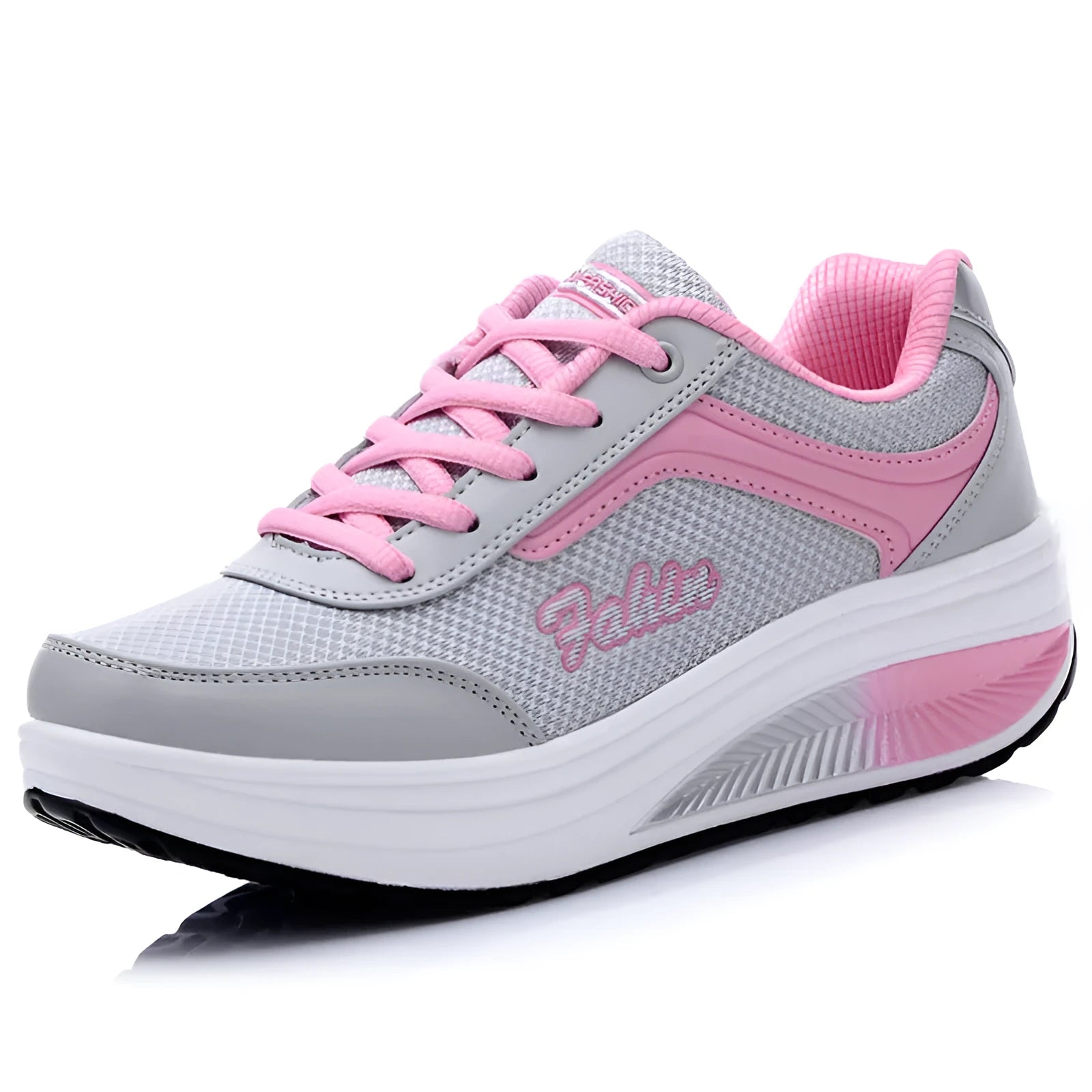 Women's grey powder mid-heel heelless travel and sports shoes on a white background.