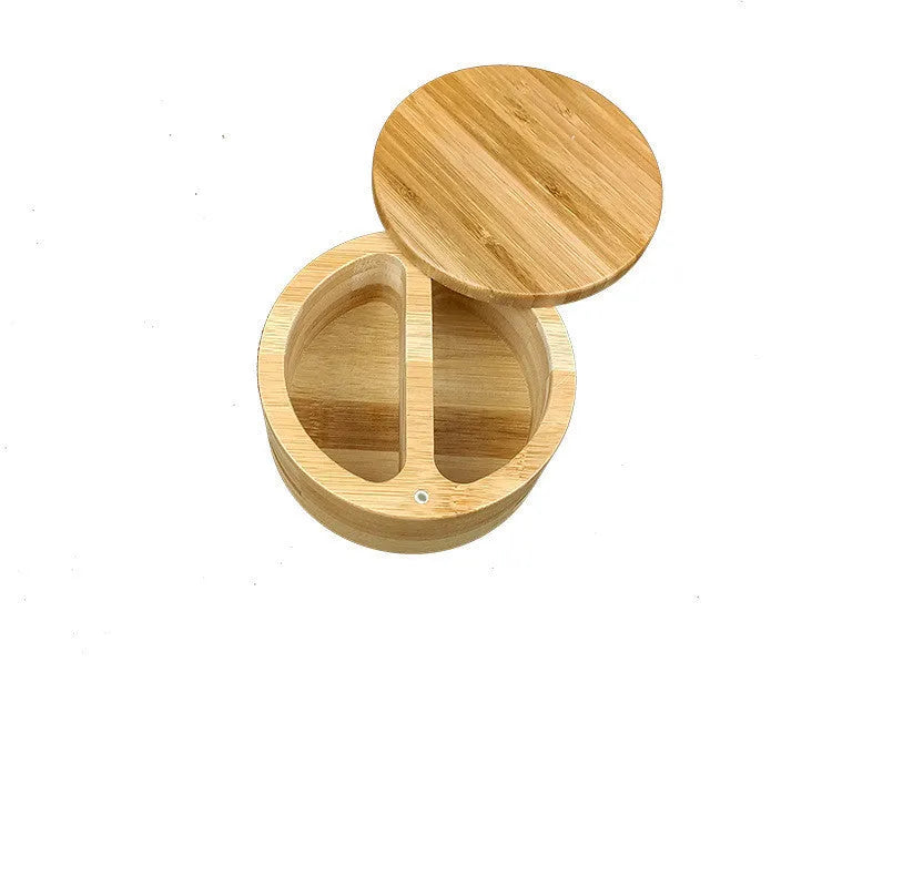 Bamboo seasoning box with choice of compartments and a 7.5cm bamboo spoon on a kitchen counter.