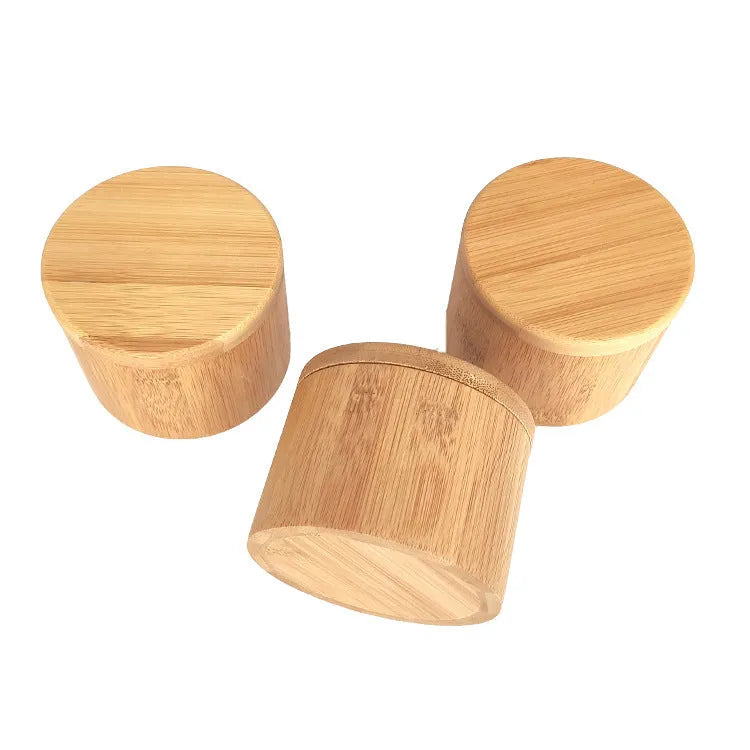 Bamboo seasoning box with choice of compartments and a 7.5cm bamboo spoon on a kitchen counter.