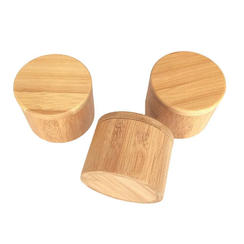 Bamboo seasoning box with choice of compartments and a 7.5cm bamboo spoon on a kitchen counter.