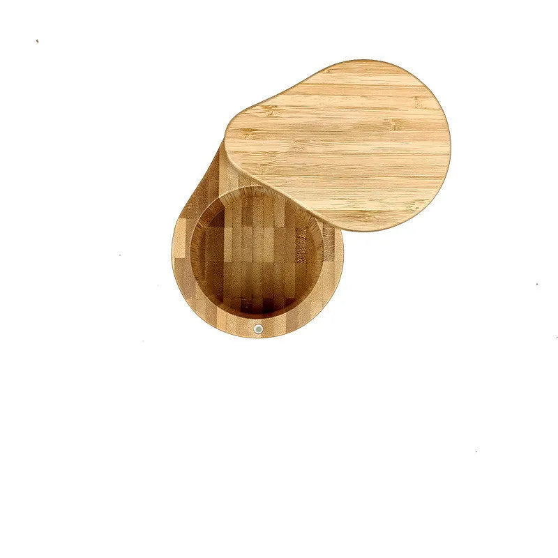 Bamboo seasoning box with choice of compartments and a 7.5cm bamboo spoon on a kitchen counter.