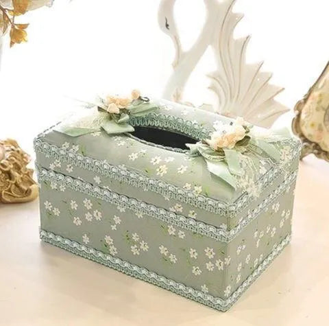 Ceramic tissue box holder in apricot colour with conventional pump opening