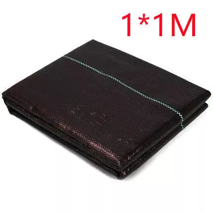 Black composite woven polyethylene weed-proof cloth roll for agricultural greenhouse use.
