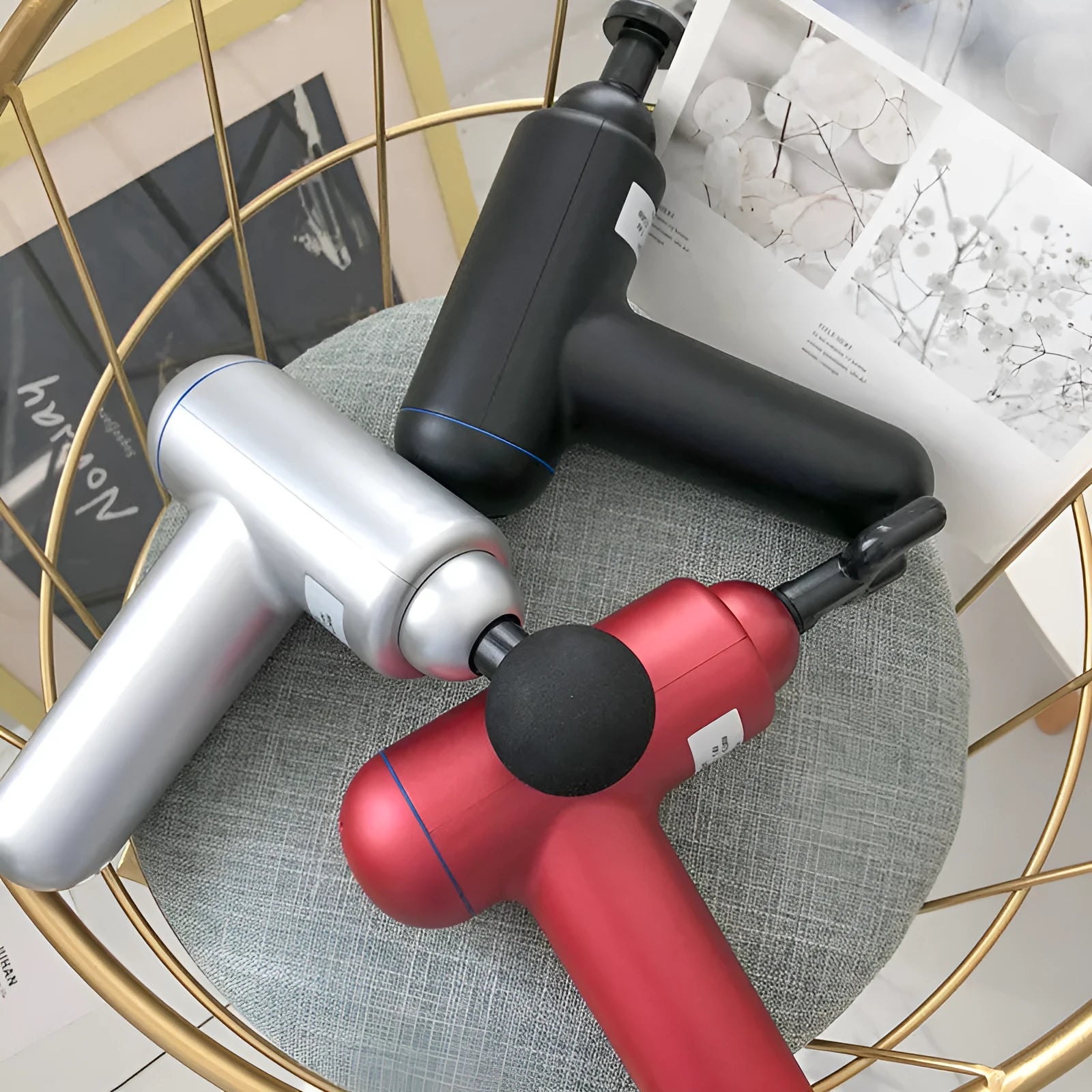 Black fascia gun massager with USB charging port for muscle relaxation therapy.