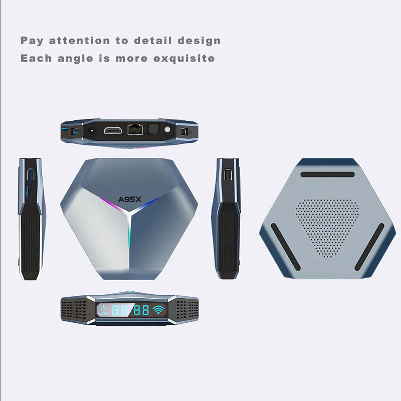 Android TV set-top box for 8K streaming with remote control and cables on a table.
