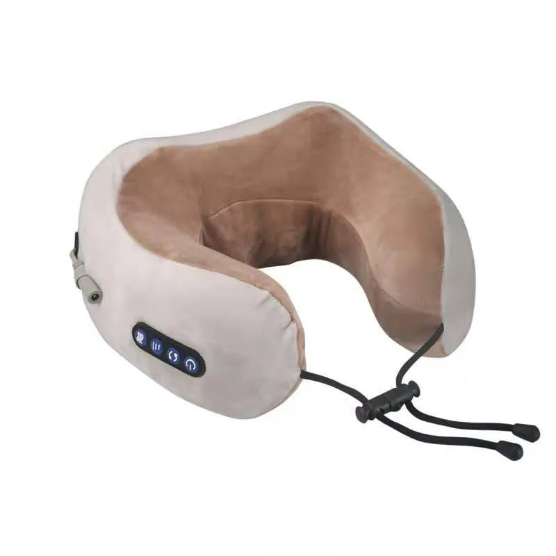 Brown U-shaped electric neck massage pillow with control buttons, shown on a table.