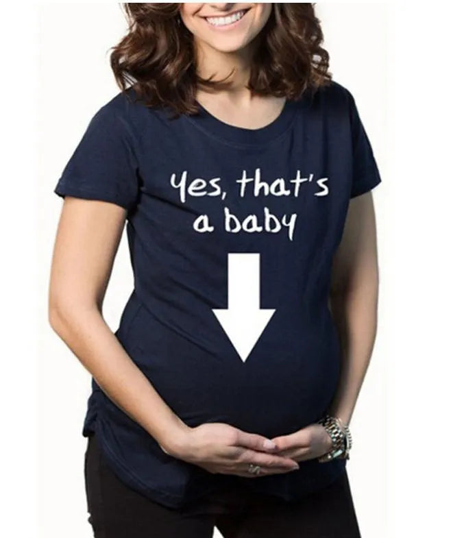 White cotton maternity t-shirt with hand print pattern, round collar, short sleeves on model