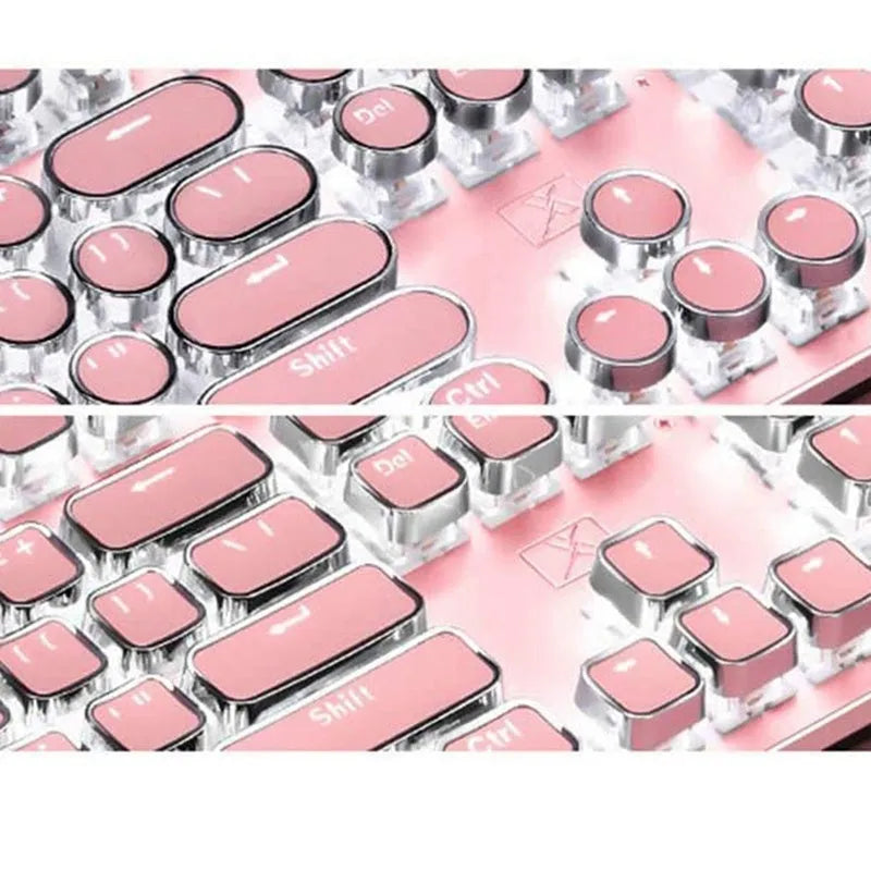 Pink and silver mechanical keyboard with green switches and white backlighting, alongside a wired mouse.