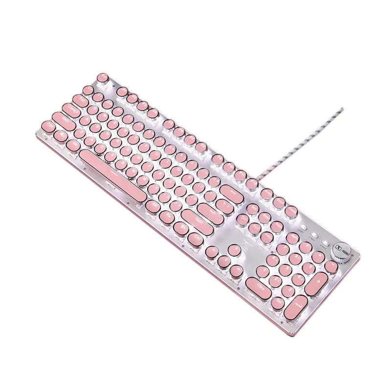 Pink and silver mechanical keyboard with green switches and white backlighting, alongside a wired mouse.