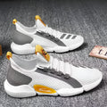 Breathable lace-up casual sports shoes in white with low heel and car suture detailing