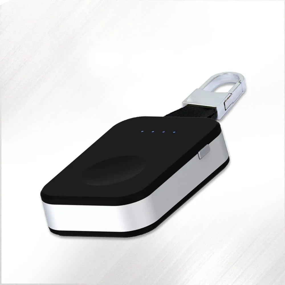 Black keychain-sized portable power bank for wireless Apple Watch charging