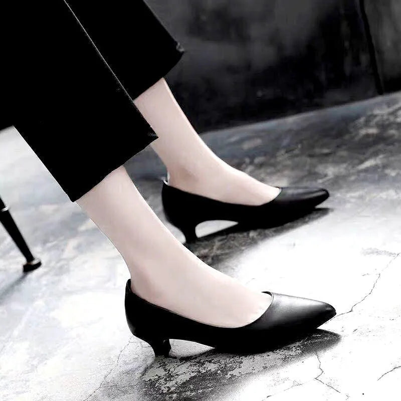 Women's silver and black wedding shoes with crystal detail and multiple heel height options