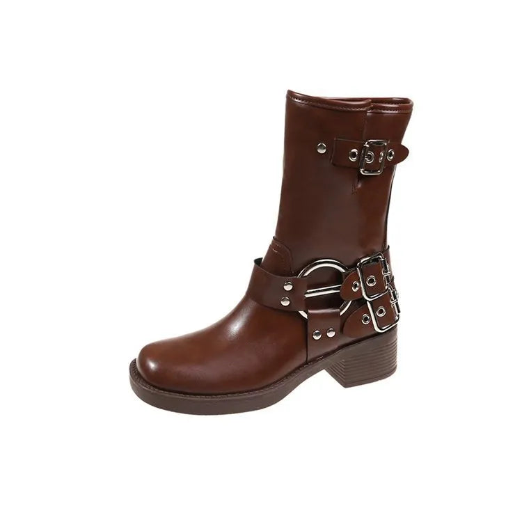 Women's black platform boot with belt buckle detail on middle calf.