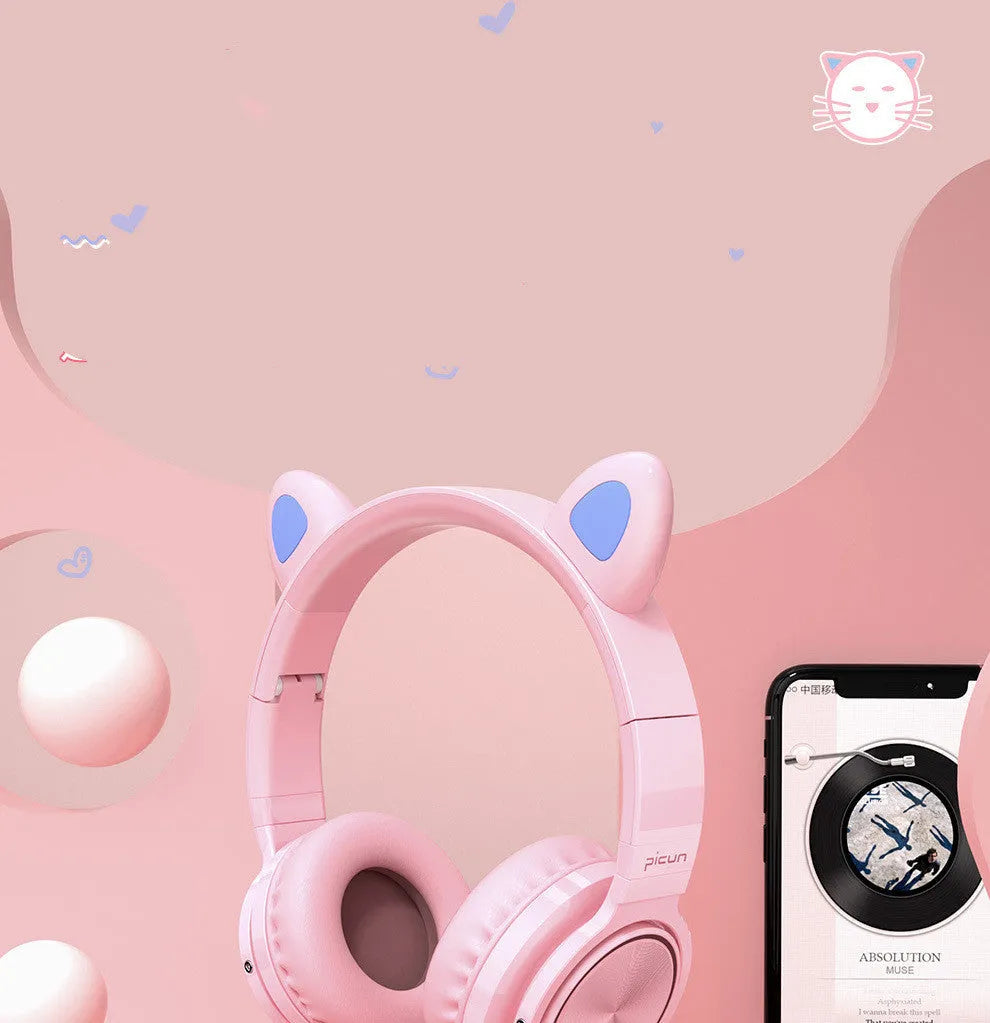 Pink white Luminous over-ear Bluetooth headset with braided wire and large ear cushions.