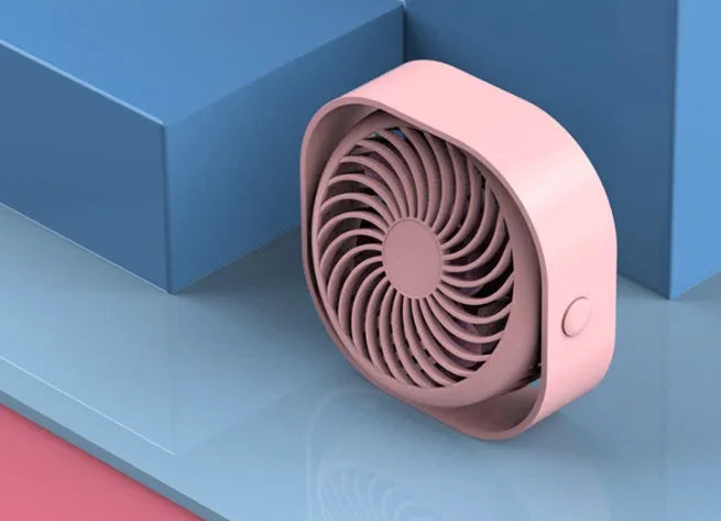 USB desk fan with rotating head in modern alarm clock design on desk