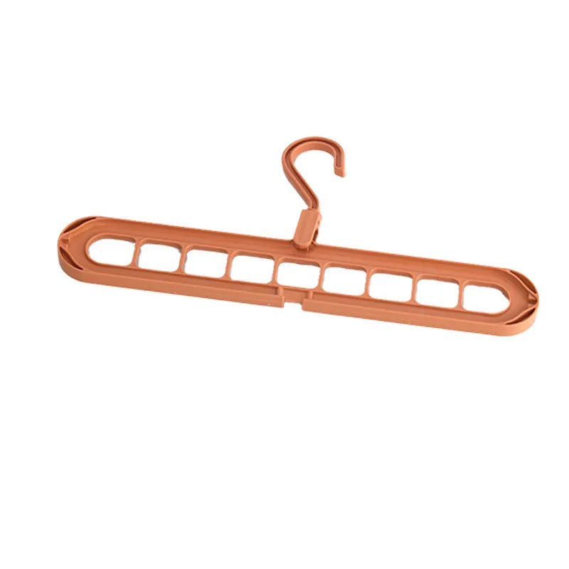 Plastic nine-hole folding pant hanger in multiple colours for dormitory wardrobe organisation