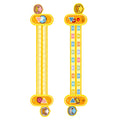 Yellow plastic children's digital resolution ruler with cartoon graphics, showing centimetre and millimetre scales.