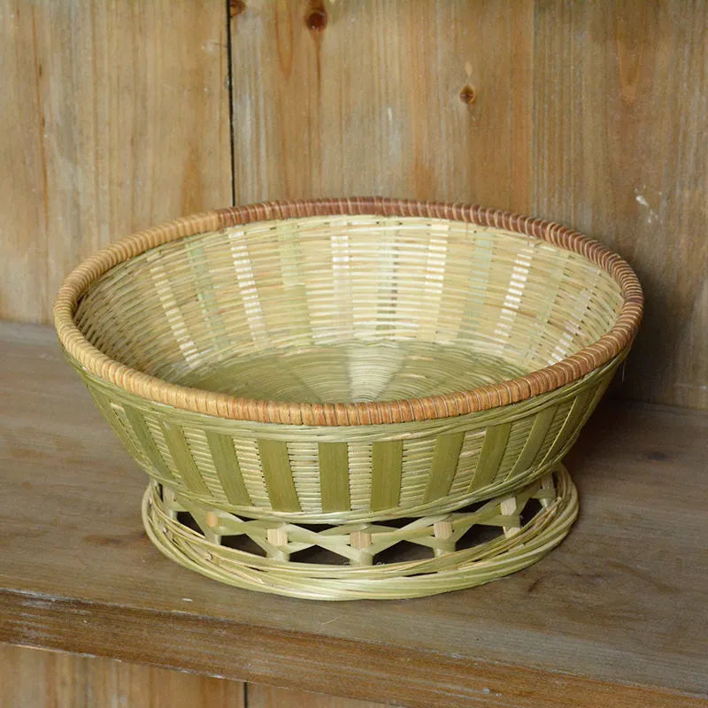 Handmade bamboo storage basket in woven construction showing three size options