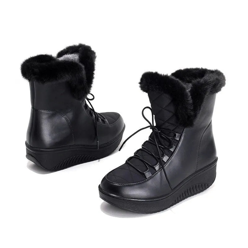 Black women's winter platform boots with lace-up front and plush lining on a white background.