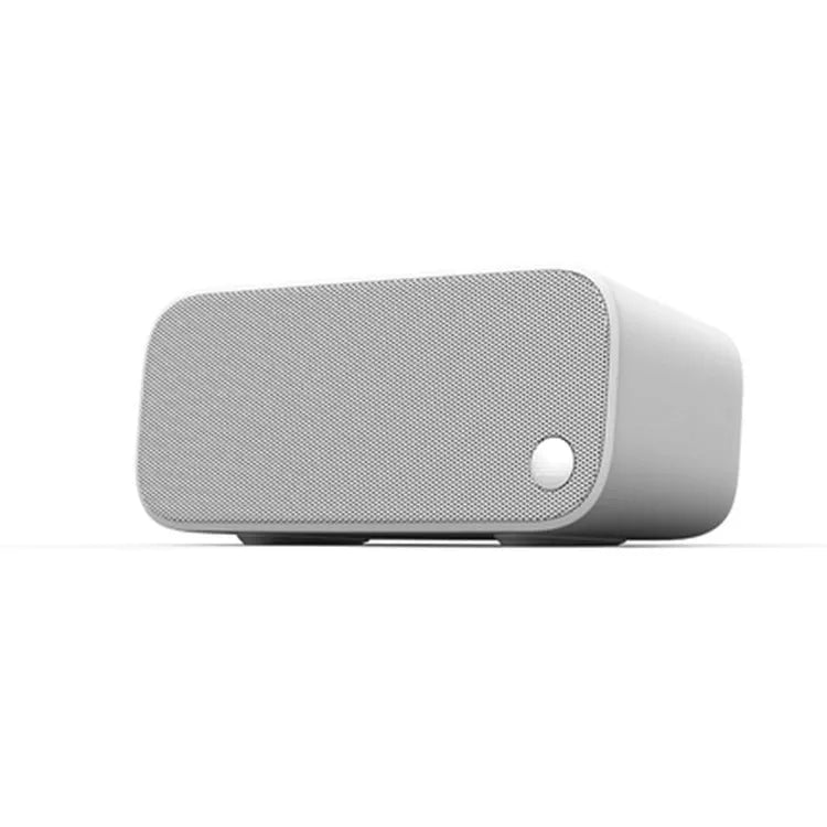 Elf sugar cube AI WiFi speaker in selected colour with front-facing design and compact bookshelf proportions