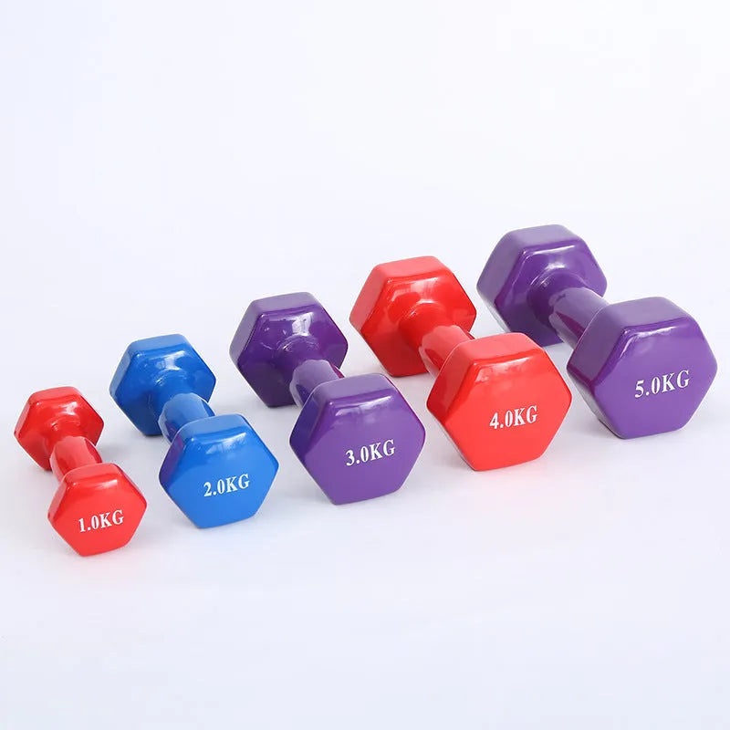Bright coloured plastic fitness dumbbells with glossy surface for yoga and aerobics