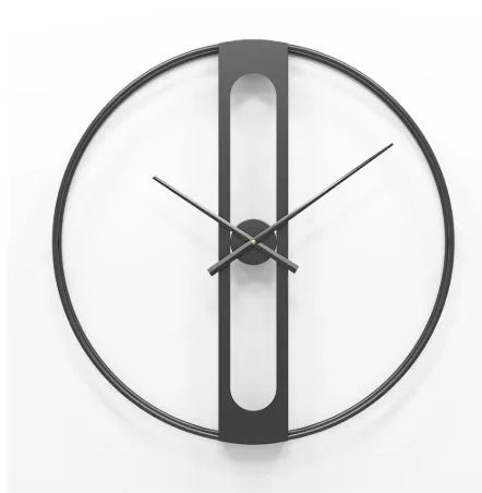 Large round metal wall clock with a 50cm diameter in a black finish on a white wall.