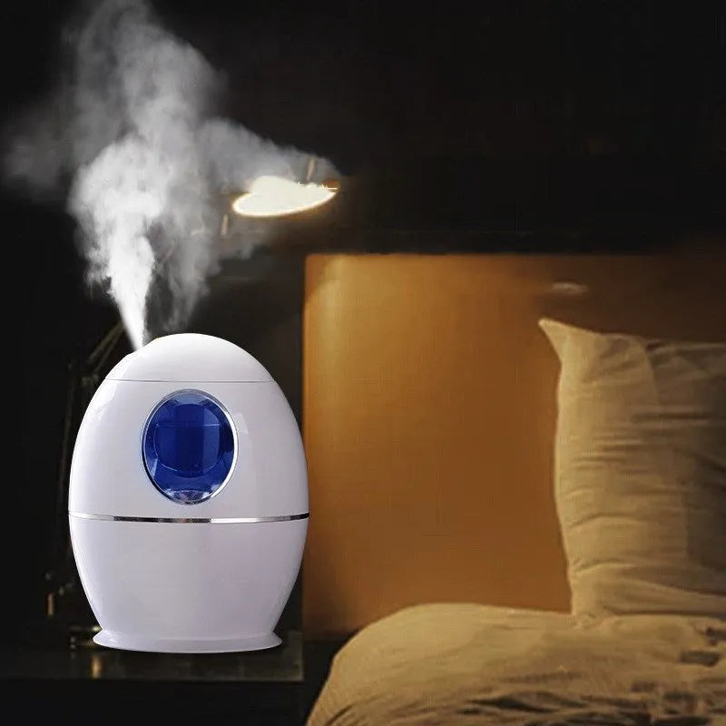 White columnar household humidifier with anion air disinfection function and USB cable.