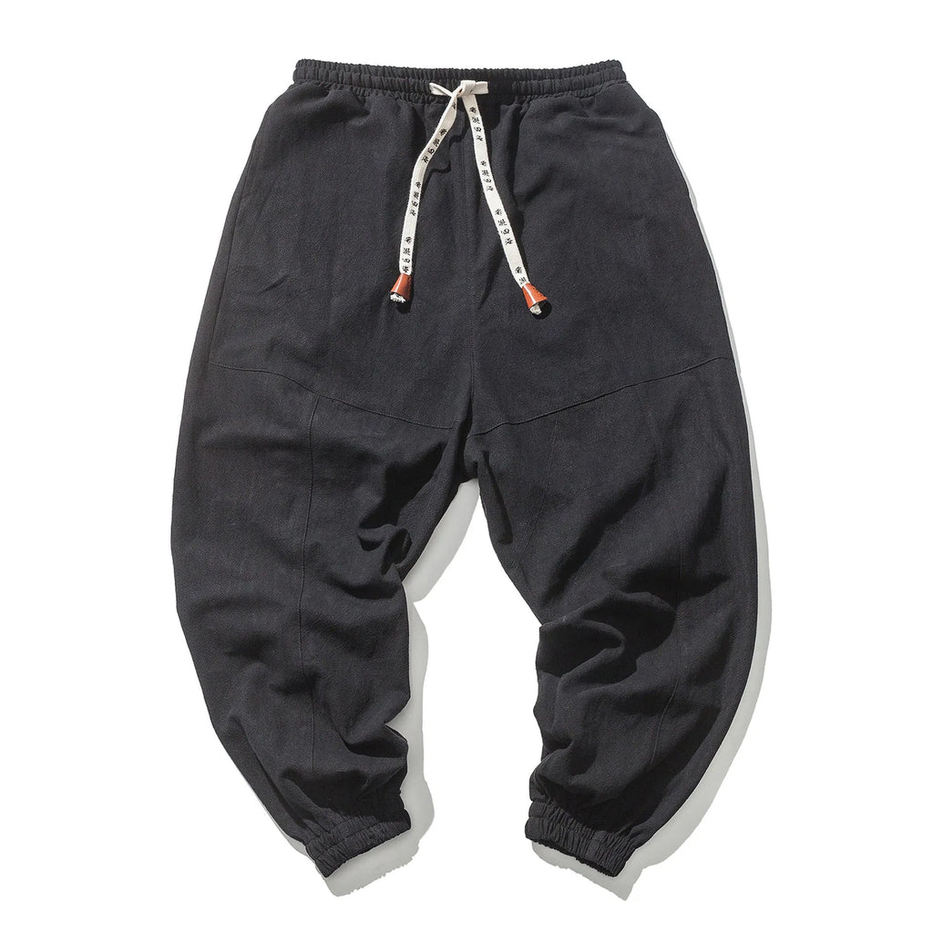 Men's black cotton hip hop streetwear joggers with drawstring waist and slant pockets