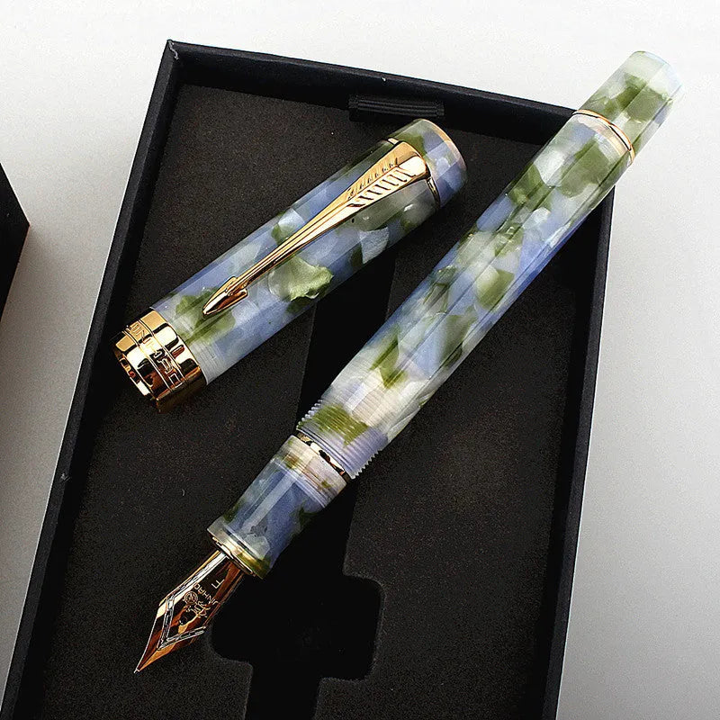 Deep bath green metal pen showing fine, medium, and graphic art tip options