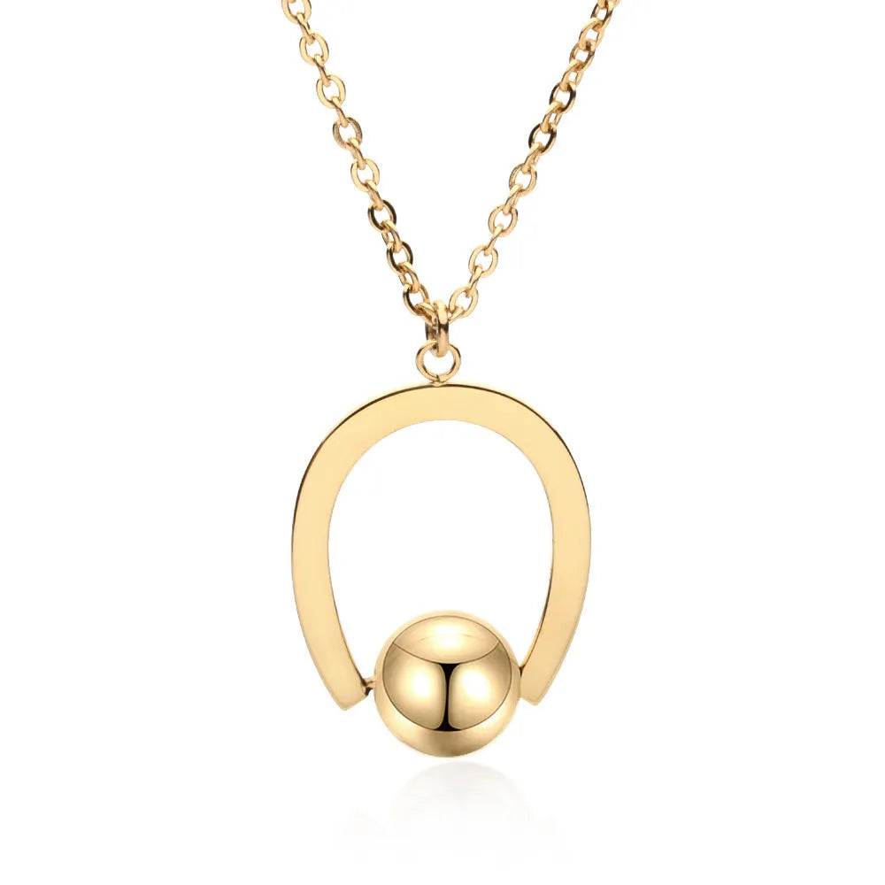 Stainless steel necklace with geometric pendant on adjustable cross chain in gold or silver finish