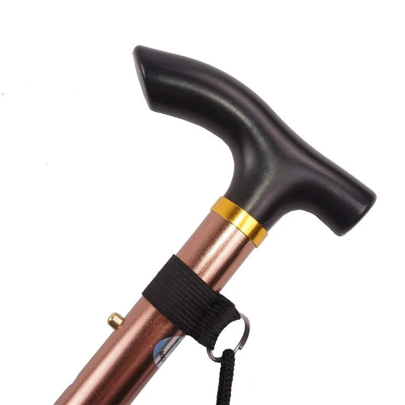 Aluminium folding walking stick extended to show adjustable height and rubber tip