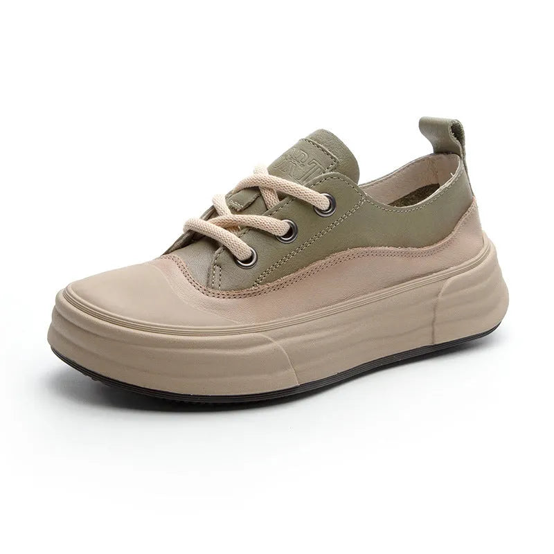 Women's leather platform sneakers in matcha green, showing lace-up front and round toe design.