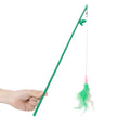 Green interactive cat feather wand toy with bell attachments for feline exercise and training