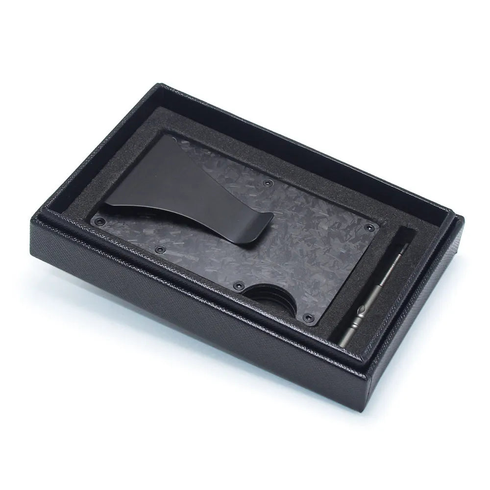 Geometric aluminium and carbon fibre card wallet for business cards and banknotes in a gift box.