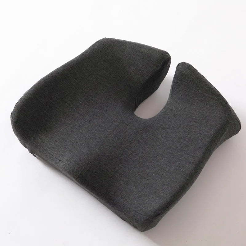 Memory foam office seat cushion in grey on a chair, showing its 36x40cm rectangular shape.